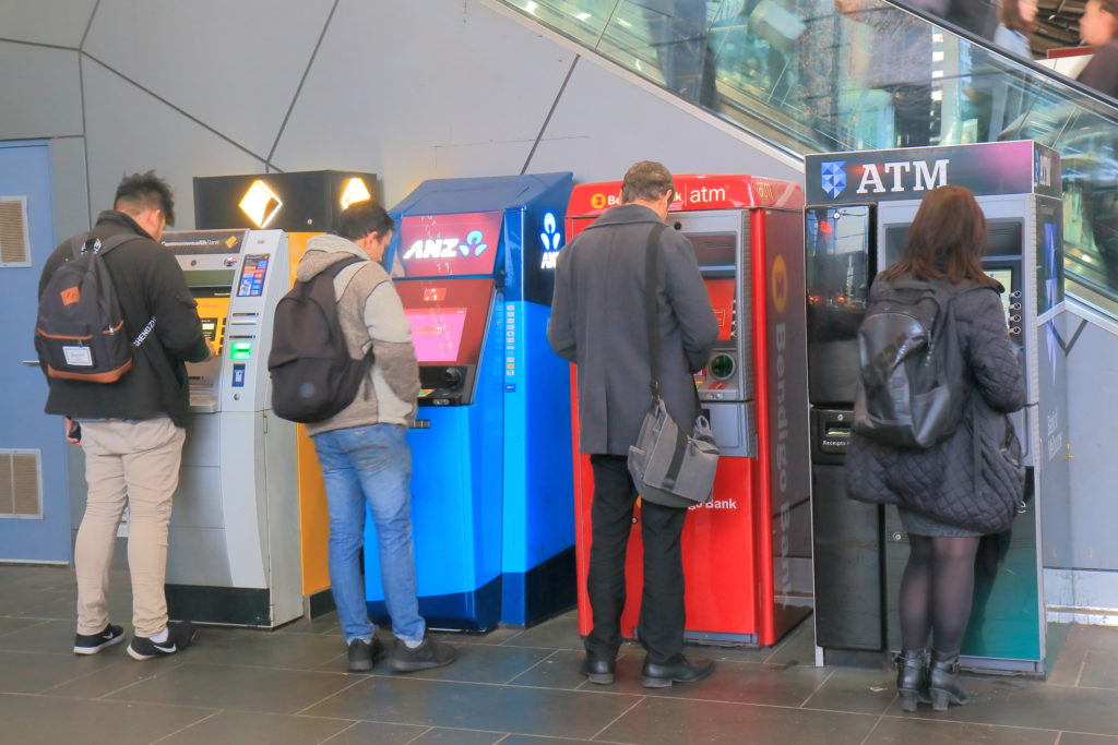 People using ATMs in Melbourne Australia