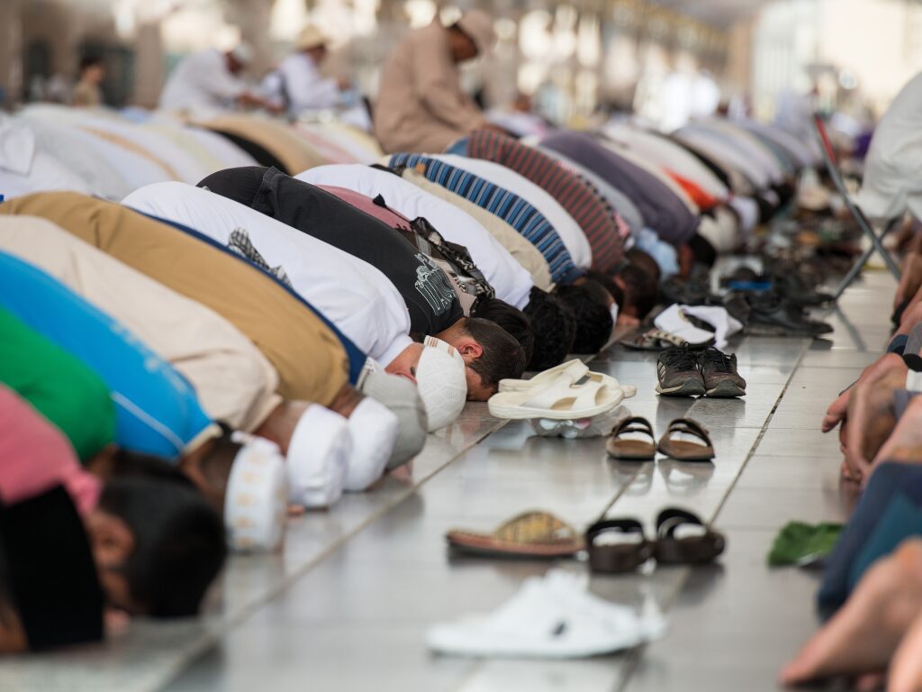 Muslims praying together in Mosque