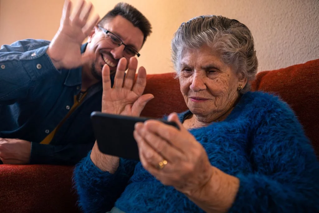 Family video call with Mum overseas on Mother's Day